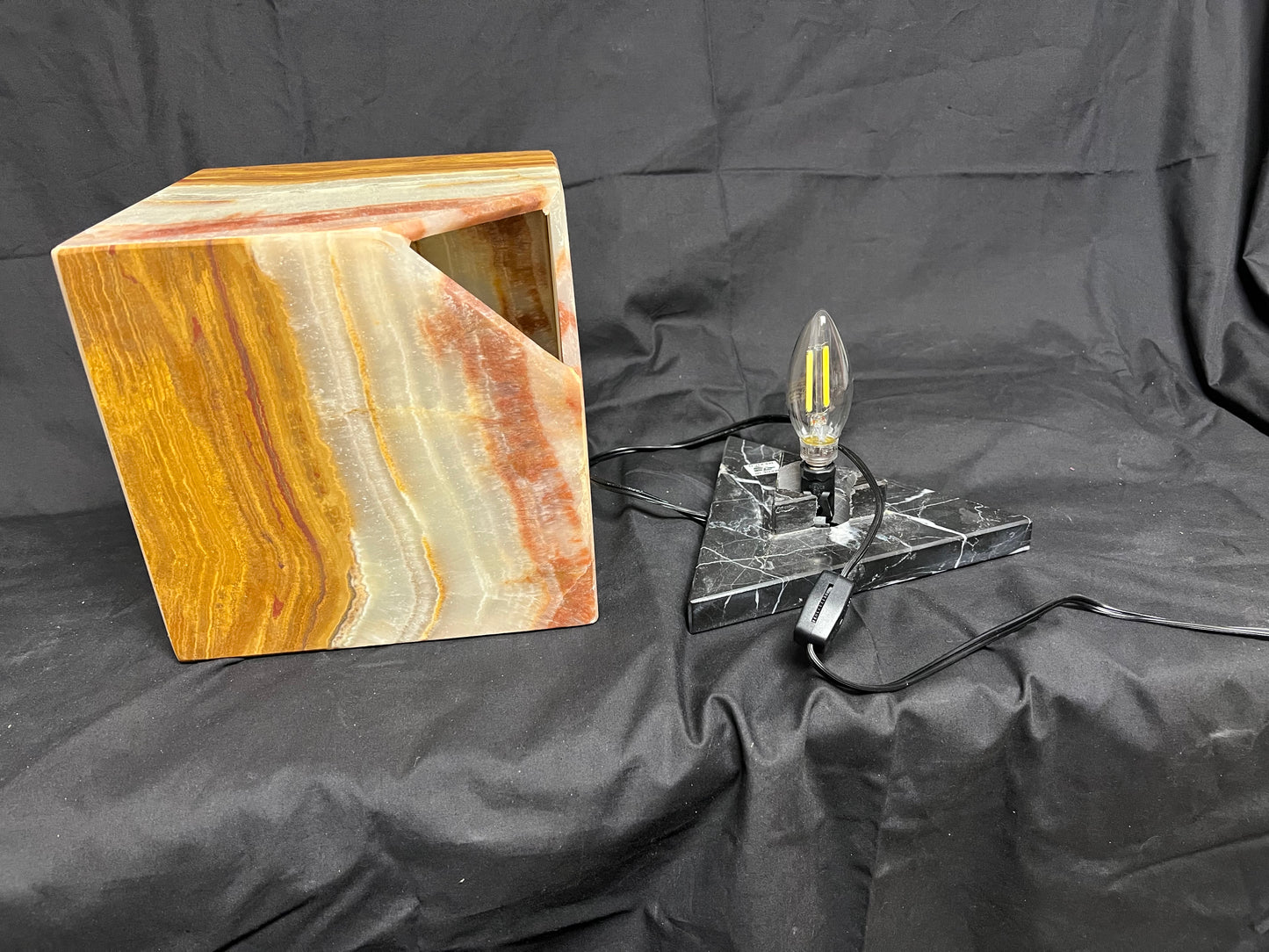 Cubed Shaped Onyx Lamp. Colors Yellow with Brown . Size 8X8X8 inches. Each has different layers and color veins .